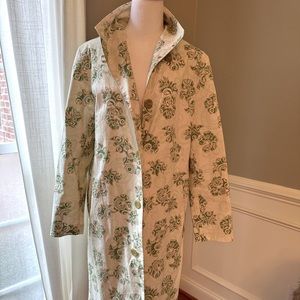 Vintage trench style rain coat! Unique pattern that will be eye catching.